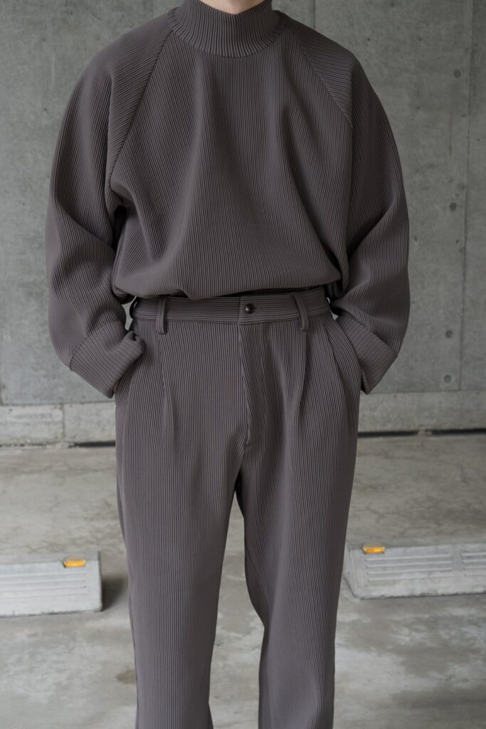 stein “PLEATS” - sign